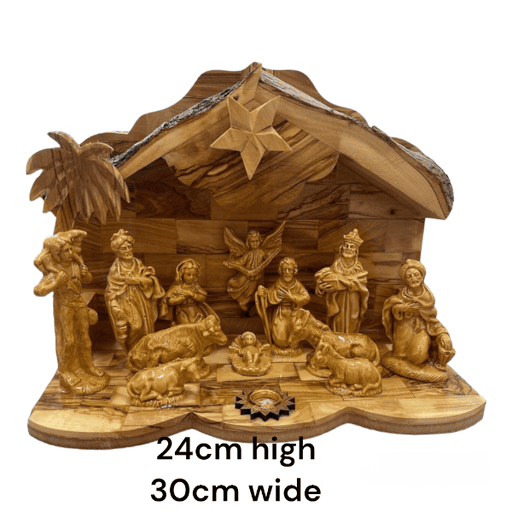 etailed wood carving of the Nativity Scene with music feature; a beautiful piece that captures the spirit of Christmas, made of natural olive wood and detailed plaster figures. 